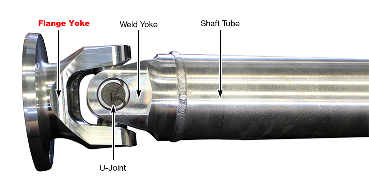 Flange yoke positioned at the end of a driveshaft, connecting the universal joint to the mating flange for torque transfer
