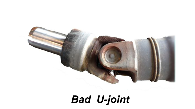 Close-up of failing U-joint causing drivetrain issues