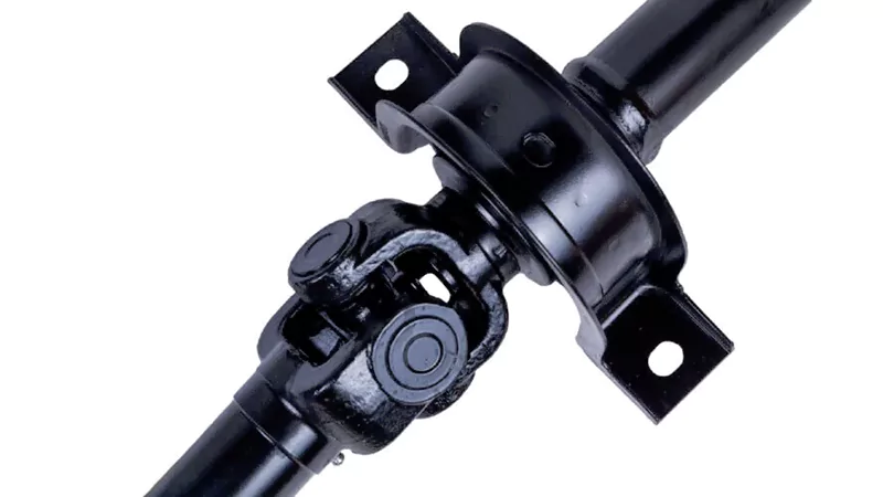 Driveshaft system showing center support bearing and universal joint assembly structure