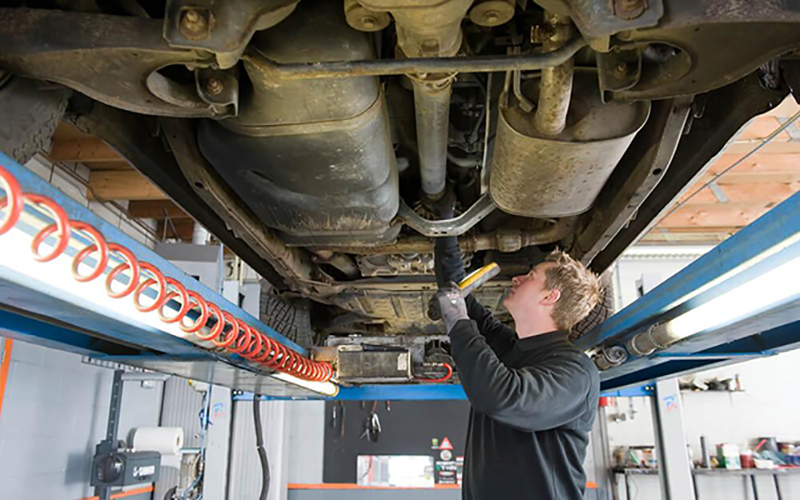 Truck undercarriage showing the driveshaft and midship stub shaft location